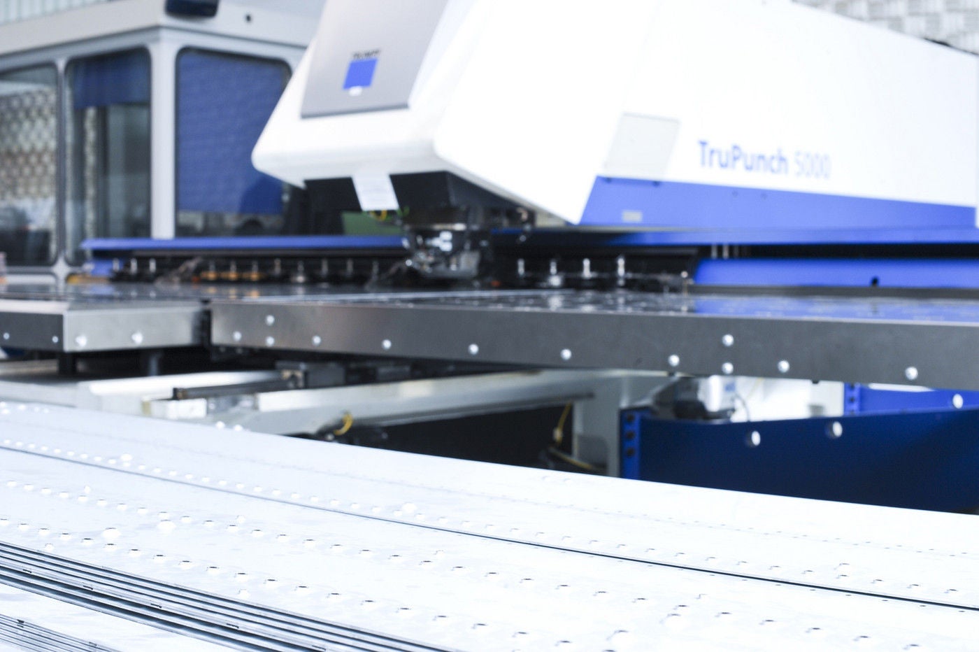 company's own sheet metal processing system